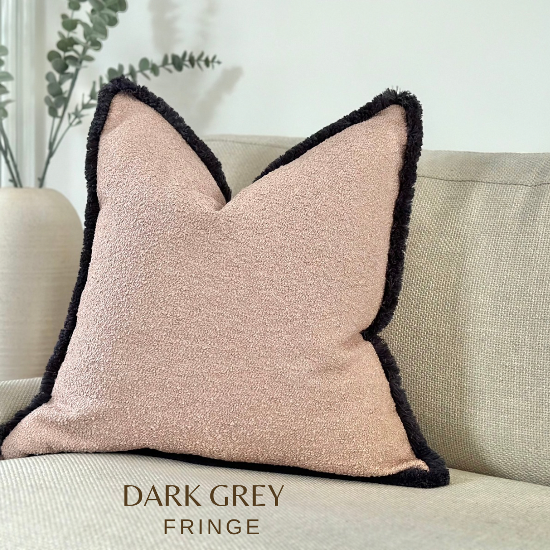 Light blush boucle cushion