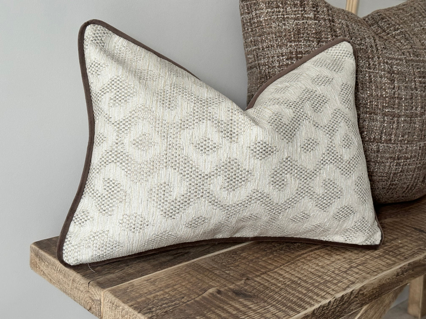 Luxury rectangle cushion In Ivory with pattern.