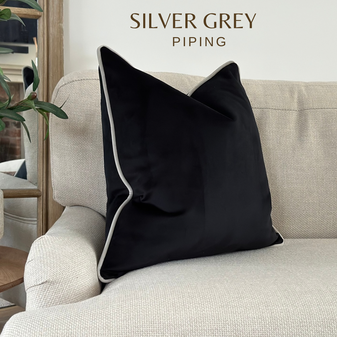 Black velvet cushion with piping