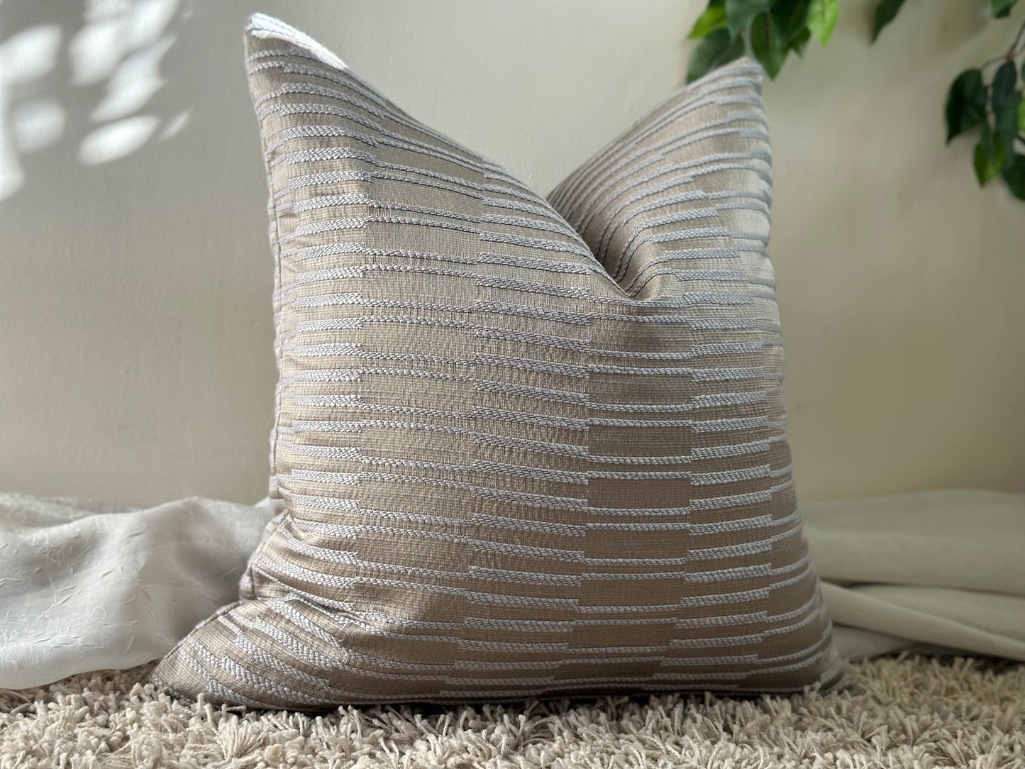textured silver pillow