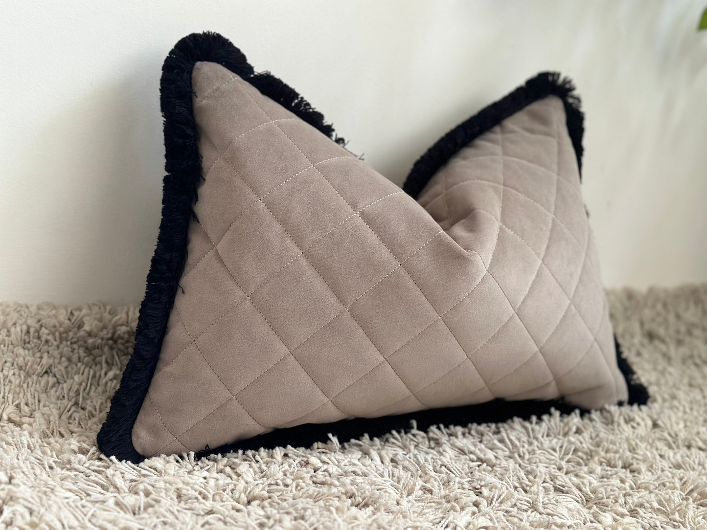 Taupe beige quilted cushion with fringe
