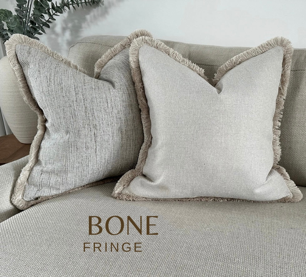 PURE | Textured Neutral cushion - Fringed or piped