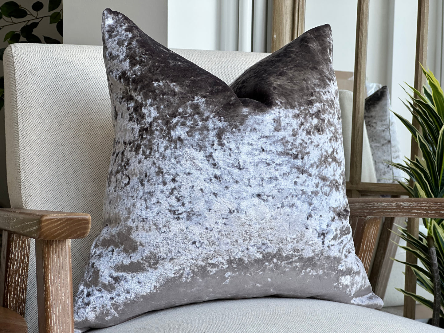 Purple grey crushed velvet pillow.