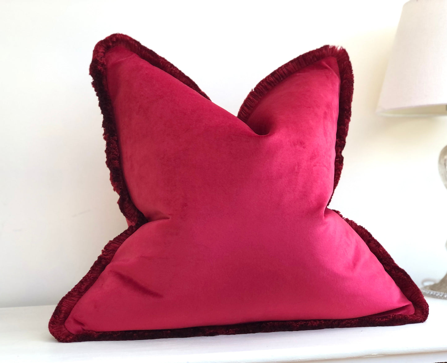 red cushion with trim
