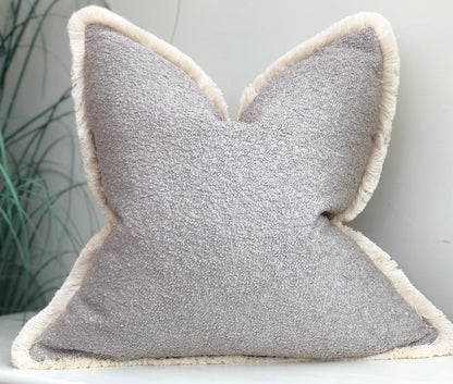 Grey boucle cushion with fringe