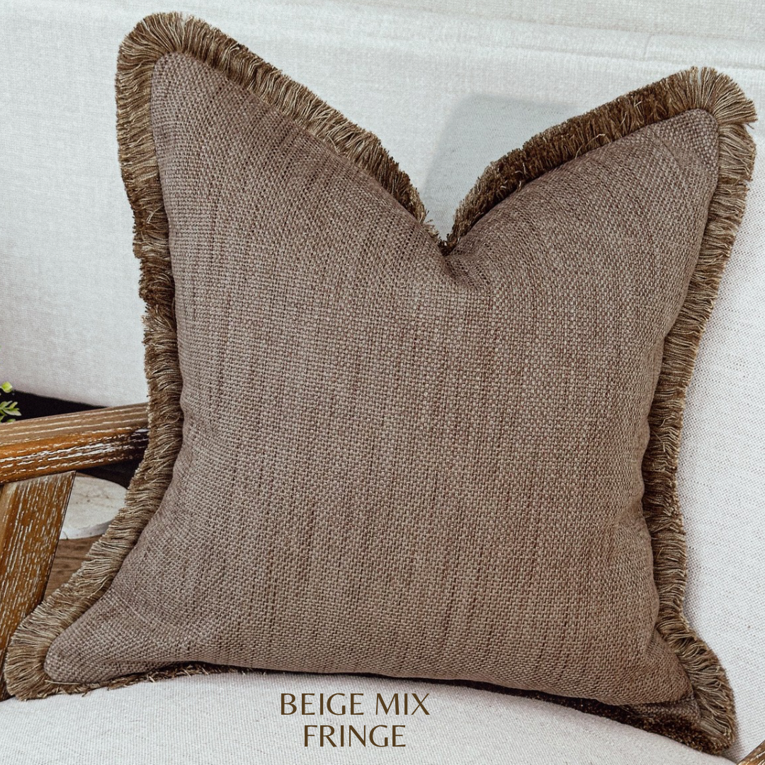 Textured weave fringed pillow cover in a warm brown cosy colour perfect for earthy neutral home decor.
