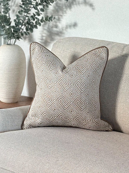 Luxury beige geometric patterned cushion