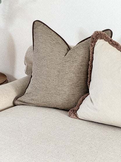 Modern organic beige throw pillow.