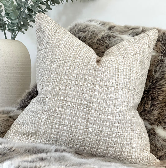 Beautiful cream neutral textured weave cushion