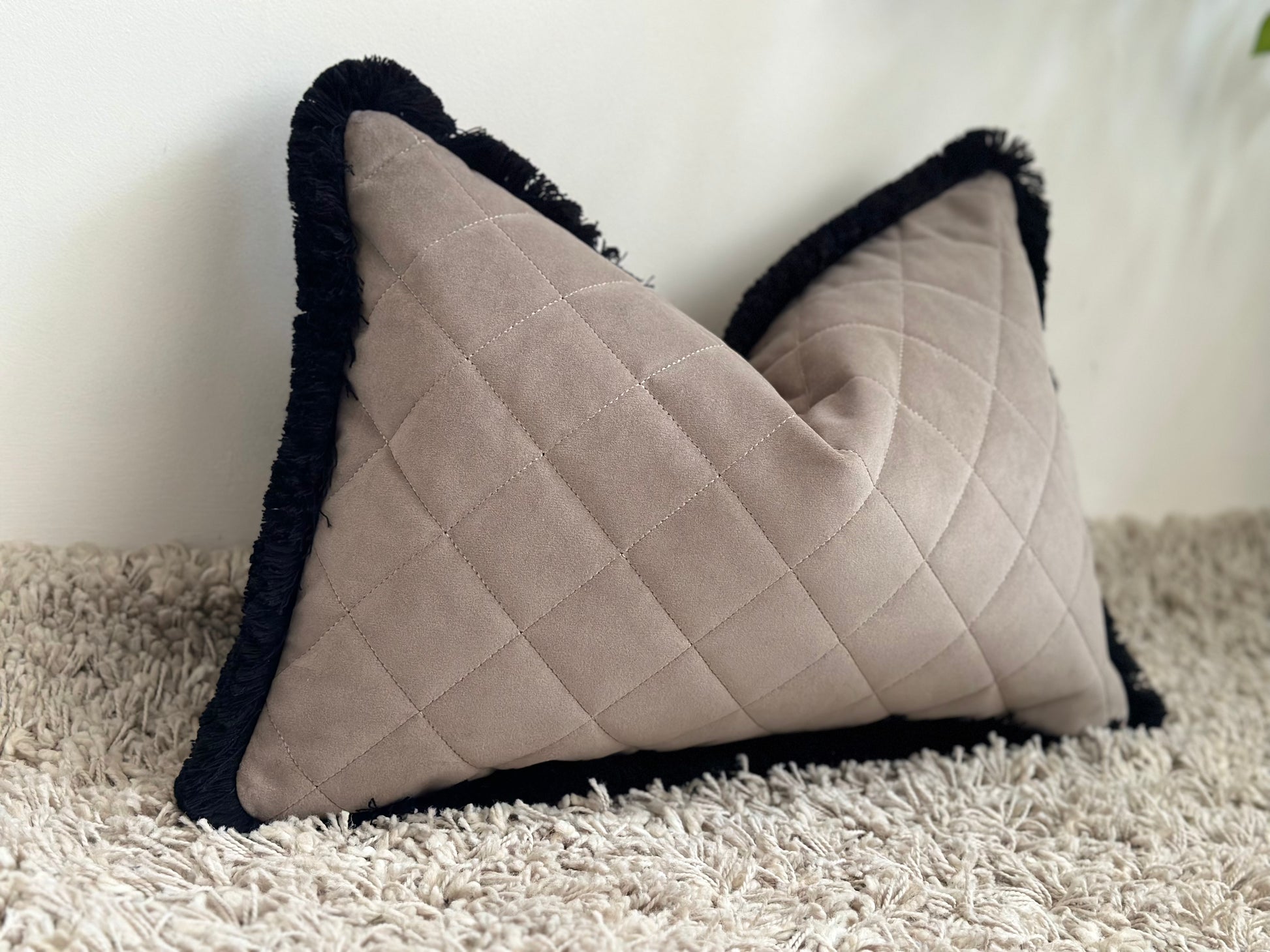 Taupe beige quilted cushion with fringe