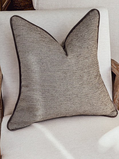 Neutral home decor scatter cushions.