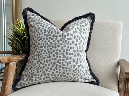 Animal print cushion with fringe