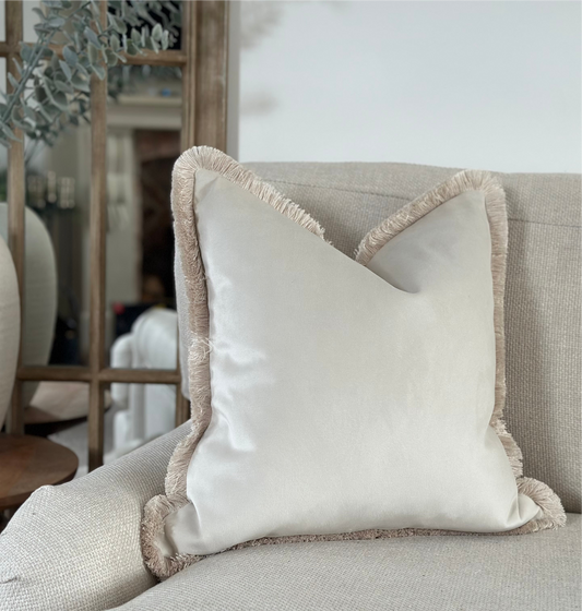 Luxury Cushions for Livingroom in an Ivory Velvet with Bone fringe trim.