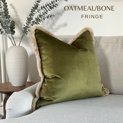 Earthy green cushion with fringe 