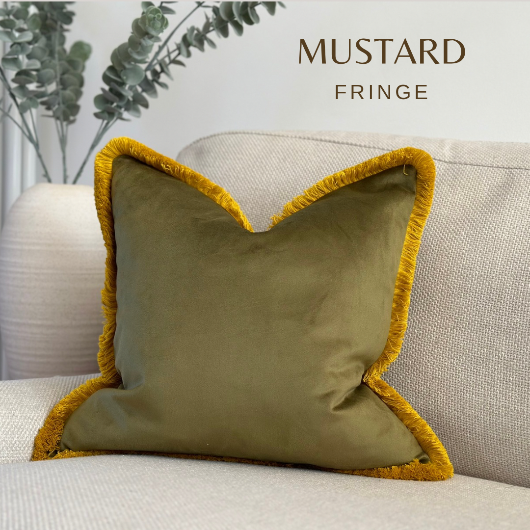 Modern Olive green luxury cushion with mustard fringed edge.