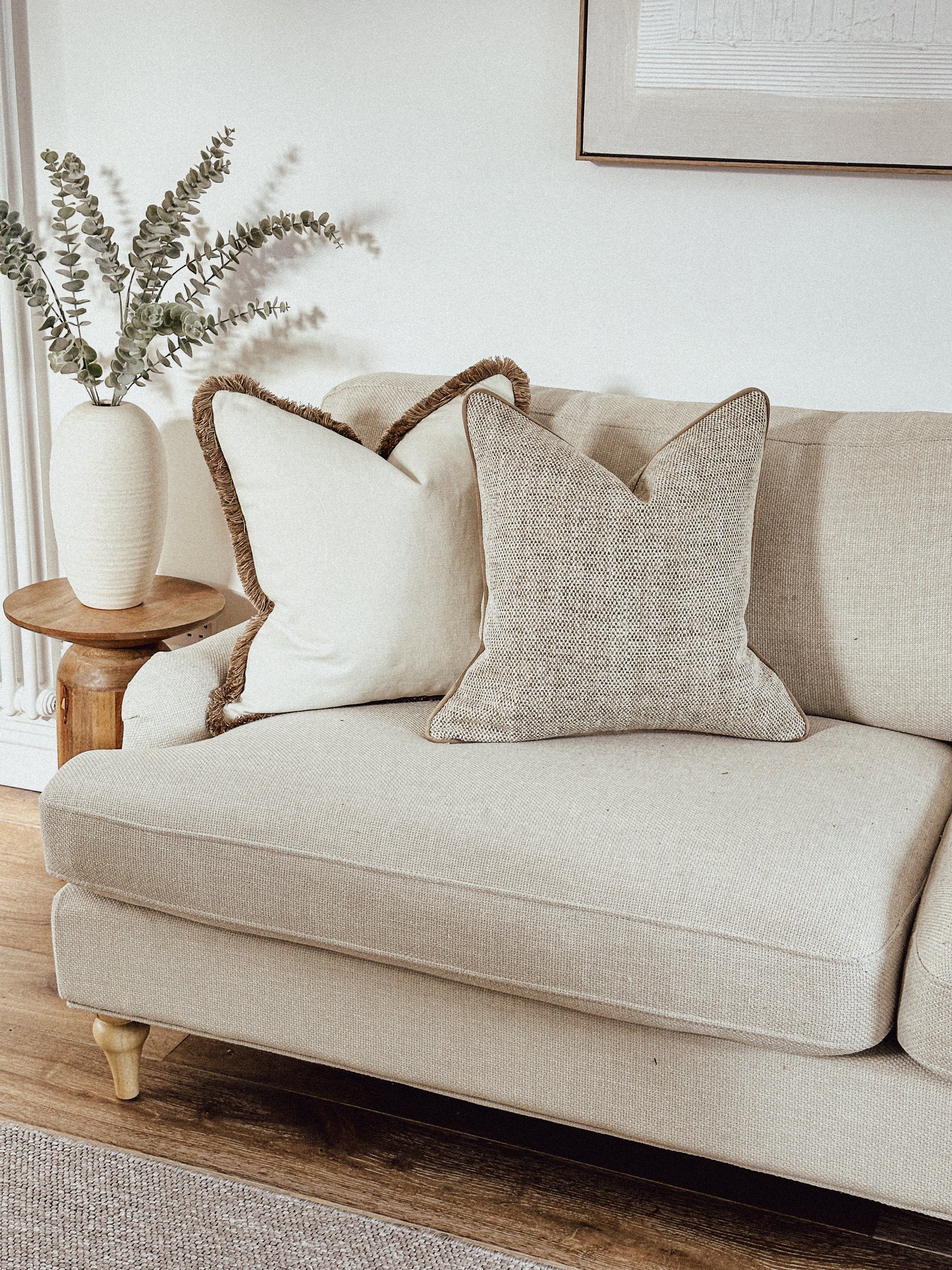 Luxury neutral throw pillows.