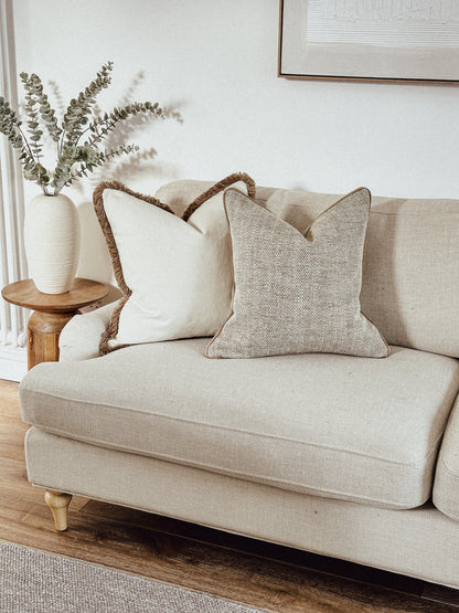 Luxury neutral throw pillows.