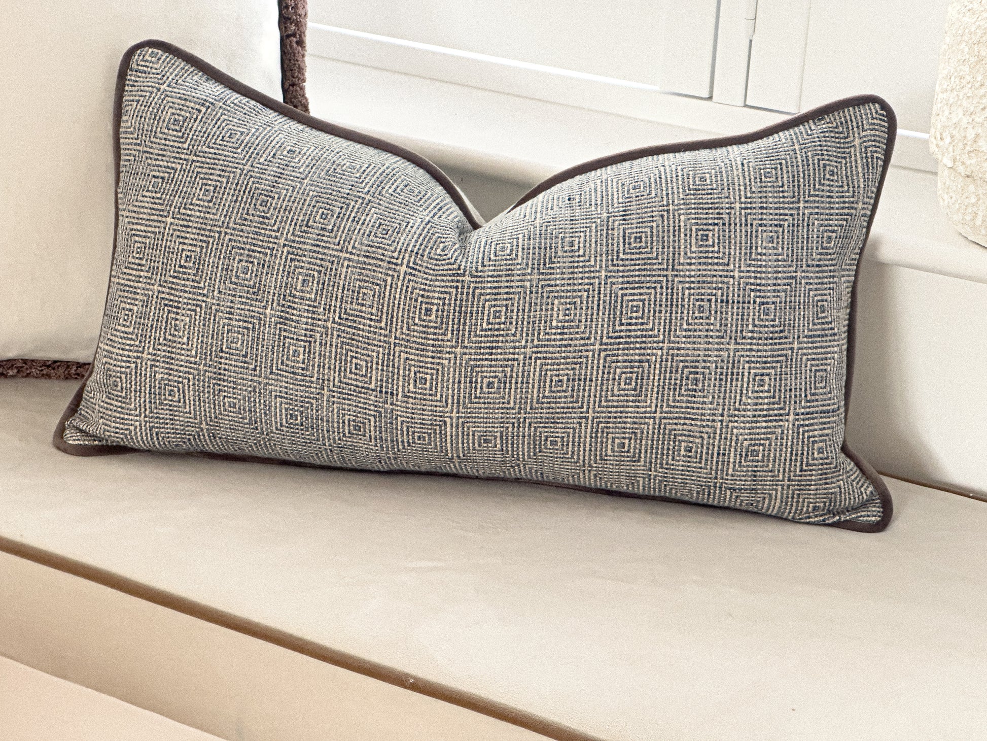 Blue geometric throw pillow perfect for costal relaxed style home decor.