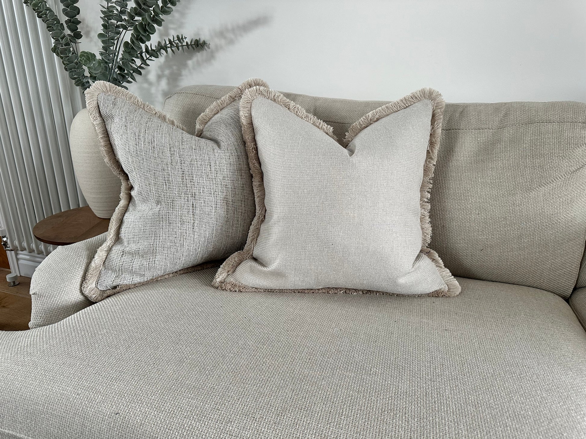 Neutral luxury cushions with fringing 
