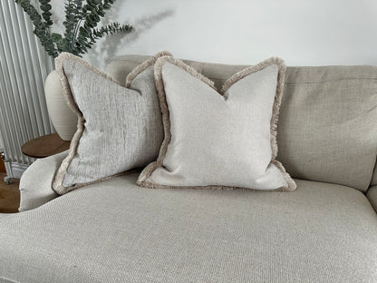Neutral luxury cushions with fringing 