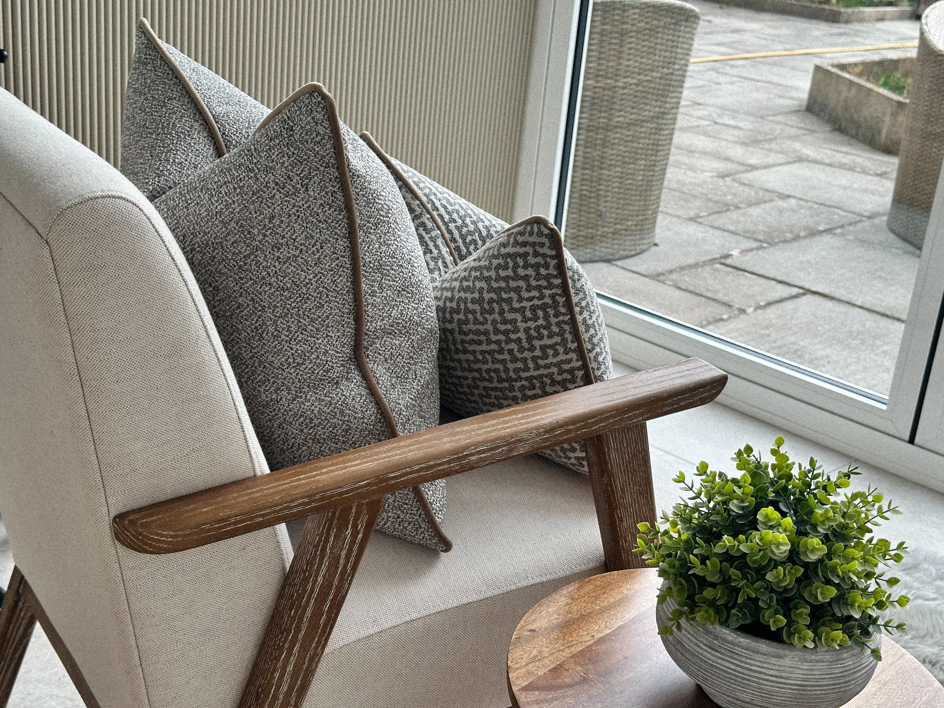 Costal style cushions for accent chair or sofa.