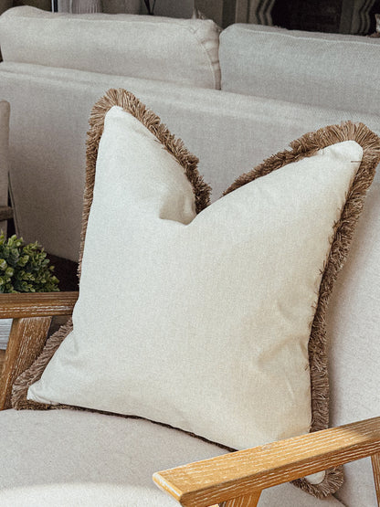 Modern farmhouse neutral cushions.