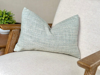 Aqua blue herringbone rectangle cushion perfect for calming costal home decor.