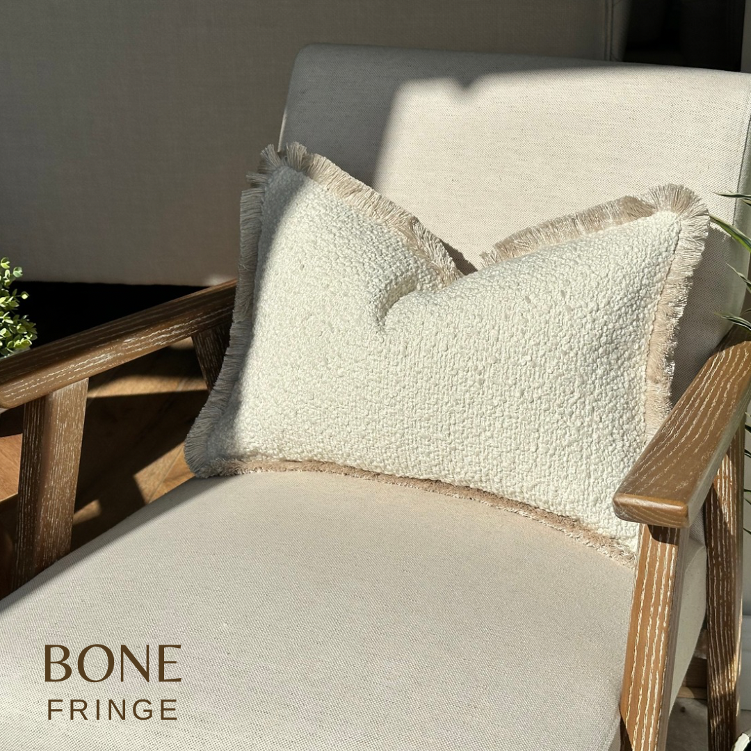 Luxury boucle boudoir cushion with fringe