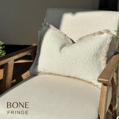 Luxury boucle boudoir cushion with fringe