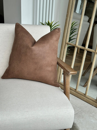 Brown tan leather look cushion, cosy rustic decor.