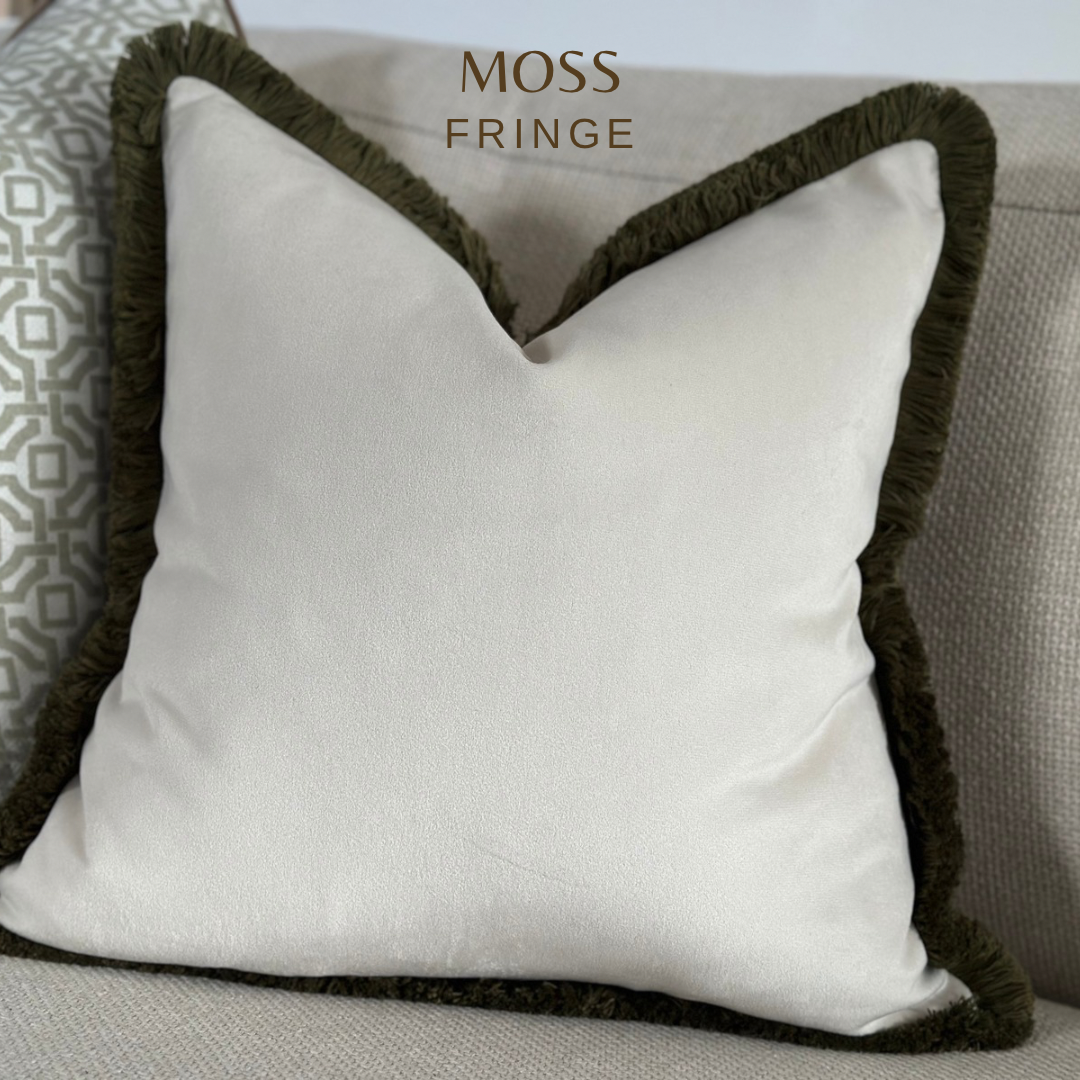 Luxury modern Ivory off white velvet cushion with moss green fringe trim for bedroom or living room. Versatile style pillow.