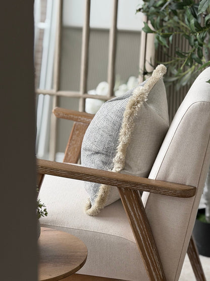 Luxury geometric fringed pillow perfect for costal decor 