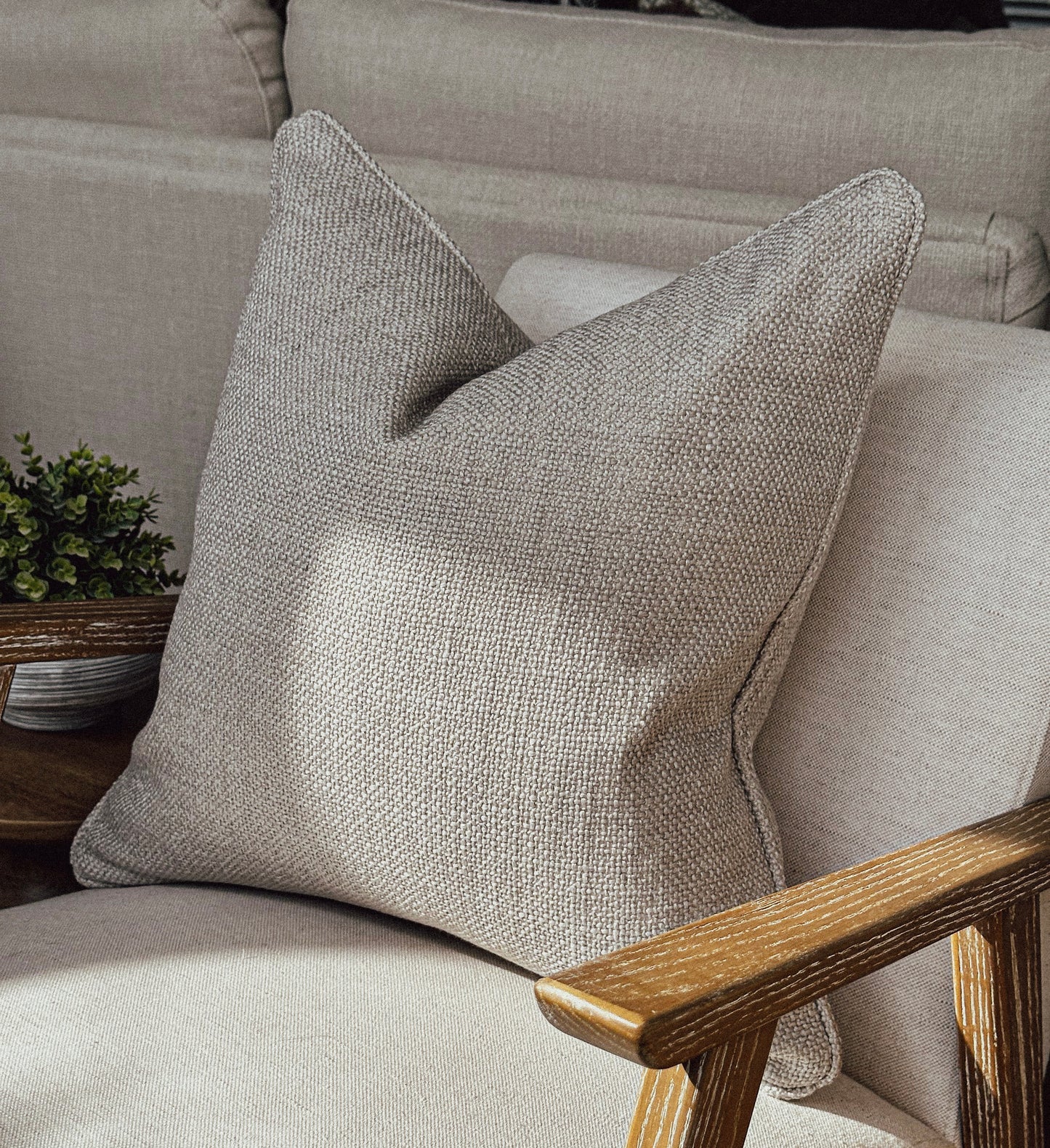 Luxury timeless grey beige textured cushion.