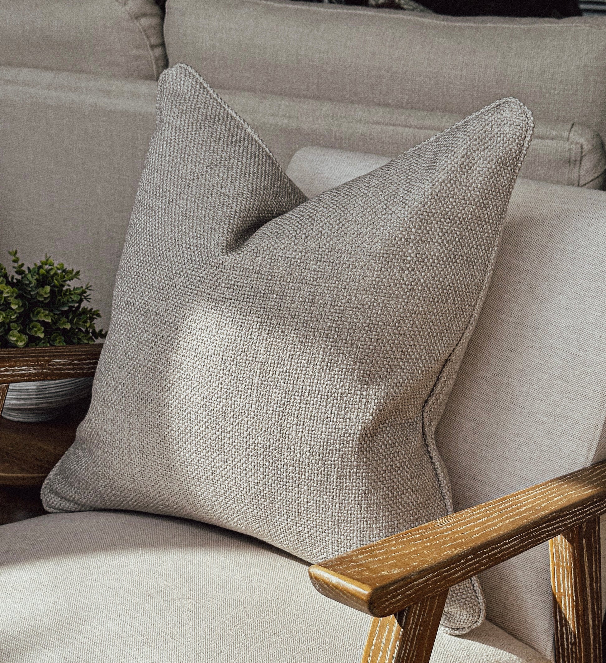 Luxury timeless grey beige textured cushion.