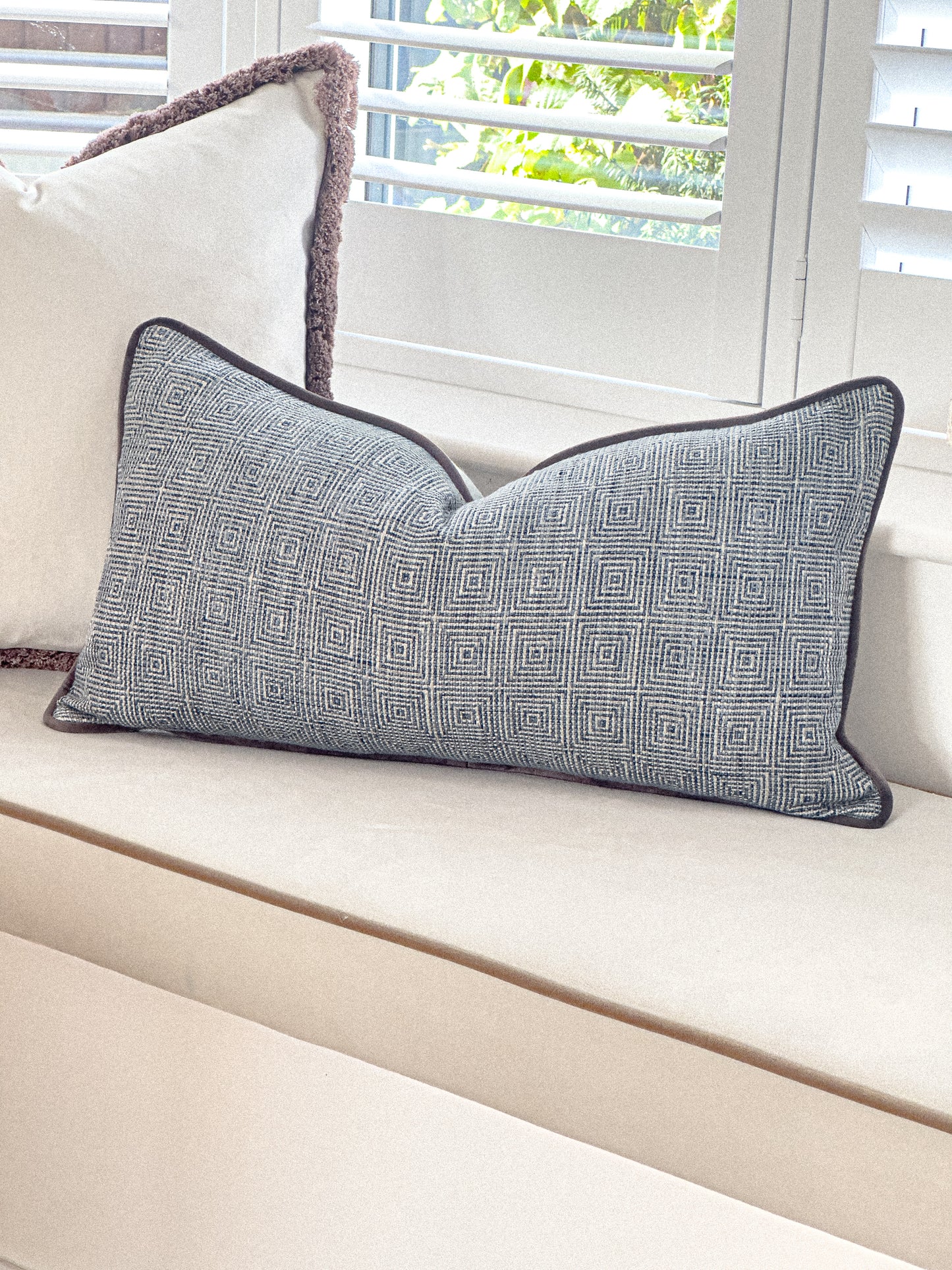 Luxury costal blue Geometric patterned cushion. 