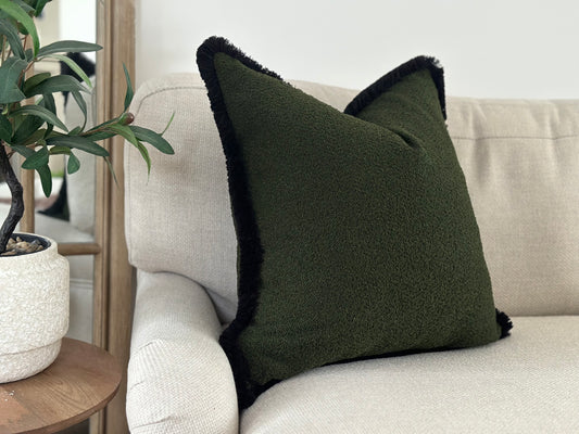 Green boucle fringed cushion