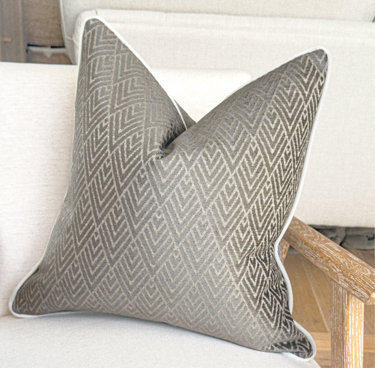 Taupe grey throw pillow with geometric design, custom made in the UK.