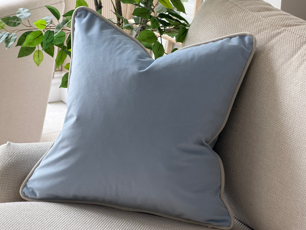 A pale blue velvet scatter cushion they are custom made with all sizes available and Customiseable piping colour.