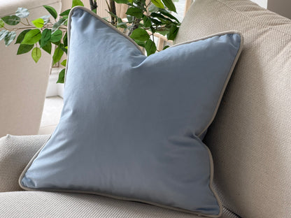 A pale blue velvet scatter cushion they are custom made with all sizes available and Customiseable piping colour.