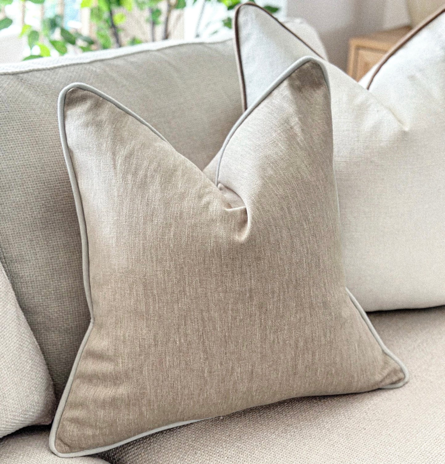 Classic stone beige scatter cushion with subtle contrast trim — perfect for earthy, understated interiors.
