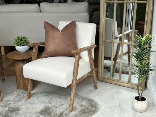 Tan brown leather look cushion for cosy rustic farmhouse decor.