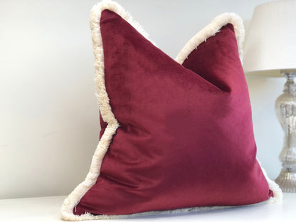 burgundy cushion with fringe