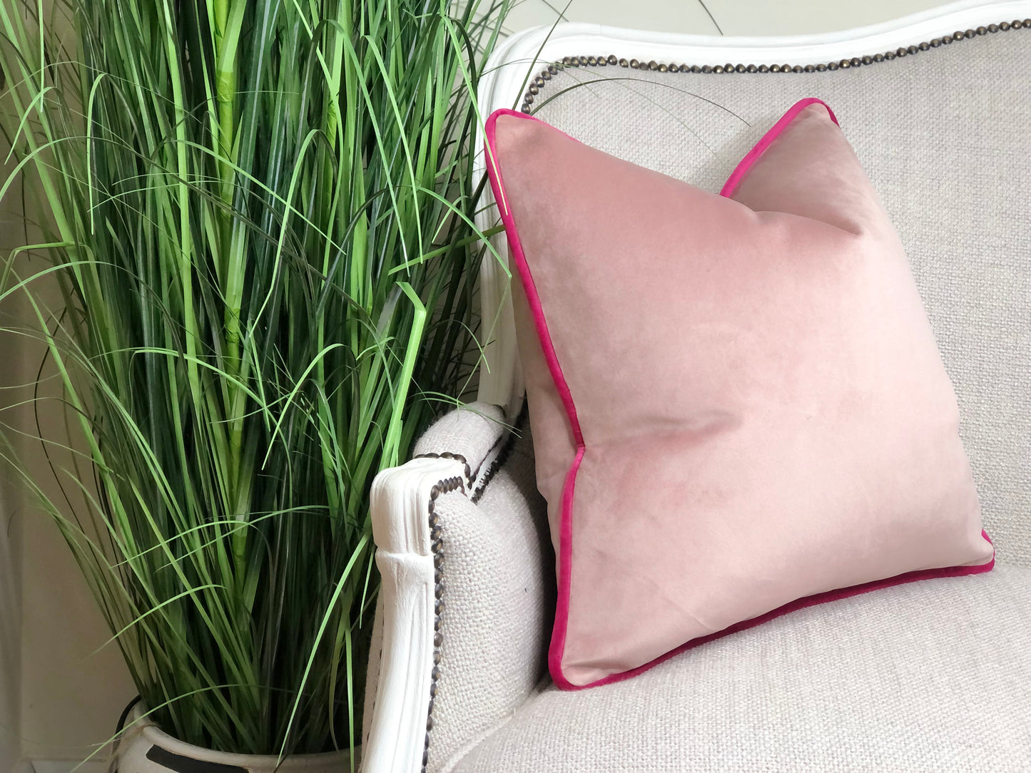 baby pink cushion with hot pink edge