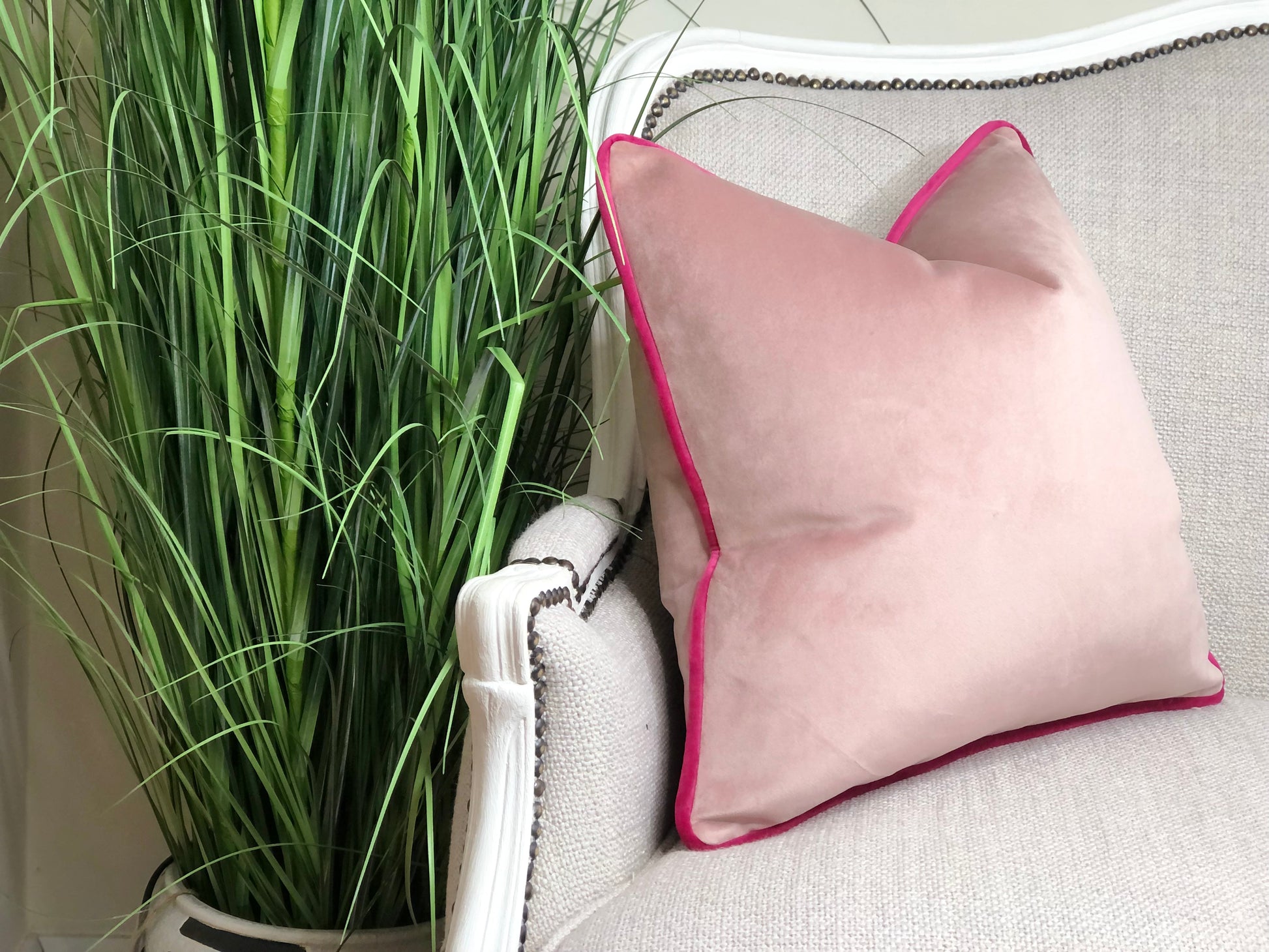 baby pink cushion with hot pink edge